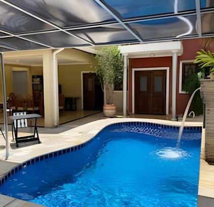 Jardim Botanico House | Casa com piscina no Botânico