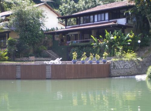 Portogalo Villa | Casa de 730m2 no Exclusivo Condomínio Portogalo com Piscina Privada e Cais para iates de até 55 Pés