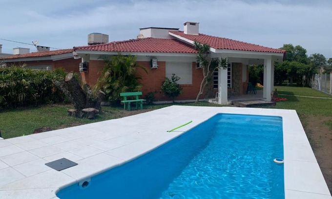 Xangri-La House | Casa em Atlântida com piscina e ar-condicionado