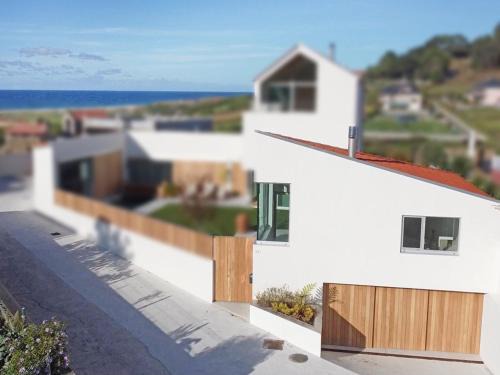 Arnados House | Casita con jardín en playa de Razo