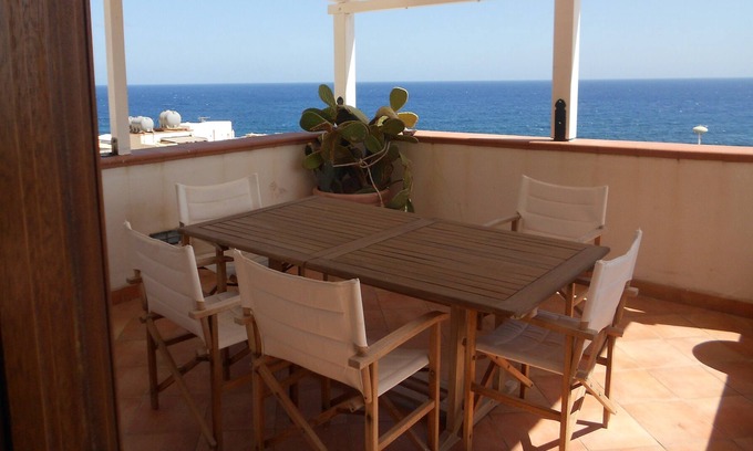 Marettimo House | Charming airplane house by the sea with terrace