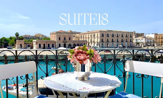 Ortigia Apartment | Charming Sea View Apartment with balcony, WiFi, Lift and 2 Bikes. Pet friendly.