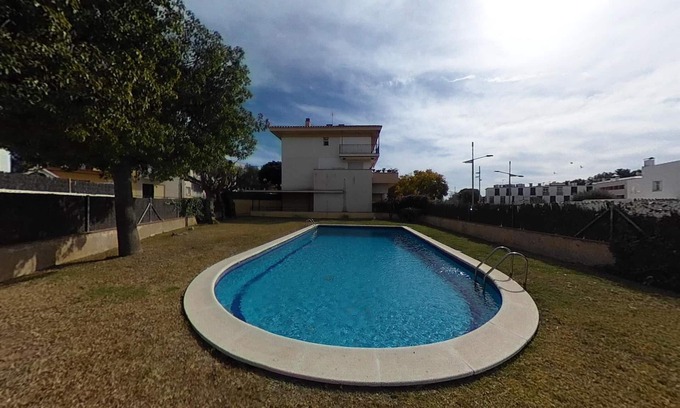 Sitges Town Center Apartment | Charming Sitges Apartment with Shared Pool & City Views