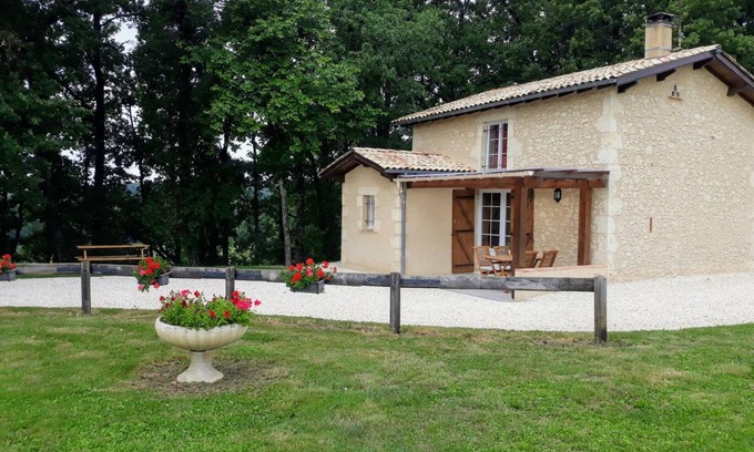 Eymet Cottage | Charming Stone House Amidst Woodlands with Terrace, Kids' Play Area, and Modern Amenities