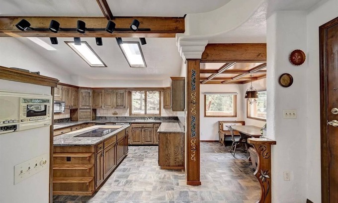 Evergreen Ski Chalet | Cheerful chalet with hot tub! Sweeping views, close to town and trails!