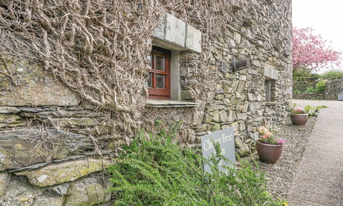 Penny Bridge Cottage | CHERRY TREE BARN, pet friendly, with open fire in Newby Bridge