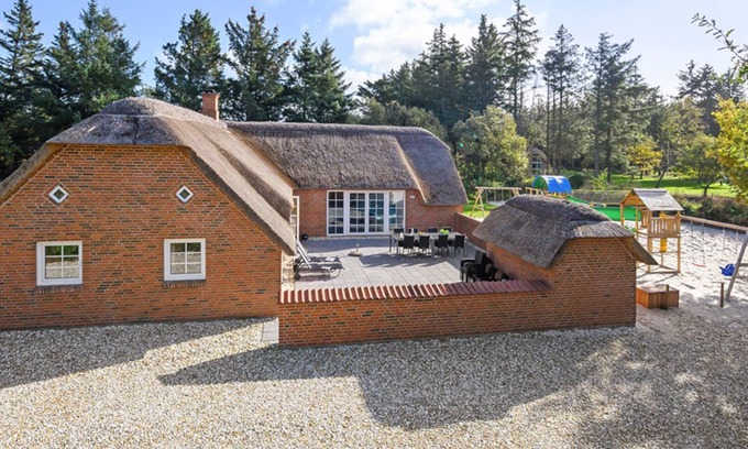 Øby House | Chic thatched house on a huge natural plot with indoor pool