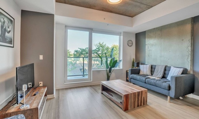 Industrial Park Apartment | Chic Urban 1BR Apt with Balcony and Skyline Views