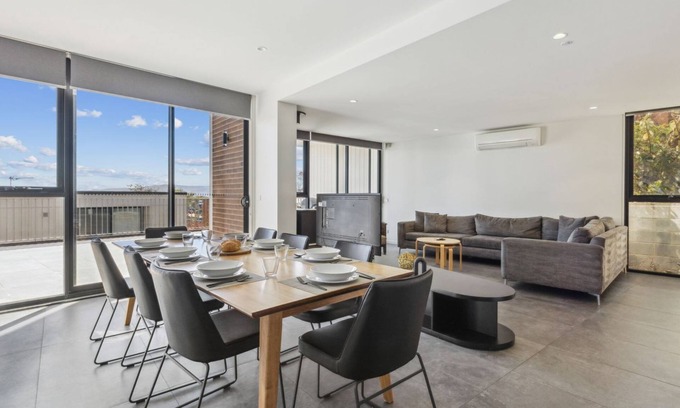 Jindabyne House | Chilam C embraces open plan living with a combined kitchen/dining/living area