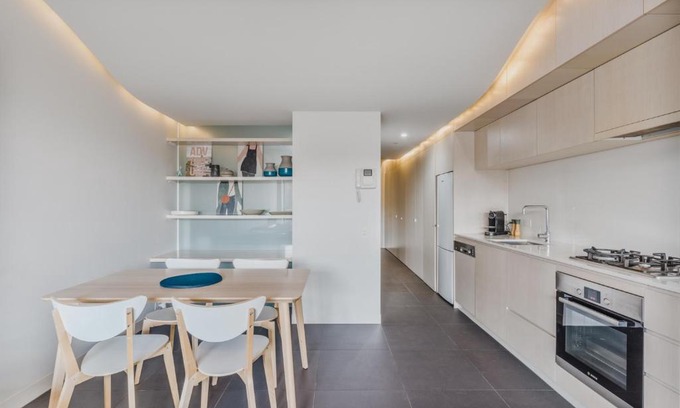 City West Apartment | City Centre Pad with Balcony and Leafy Park Views