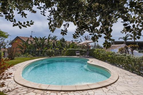 Picanello-Ognina-Barriera-Canalicchio Apartment | City Cottage with Garden & Pool by Wonderful Italy