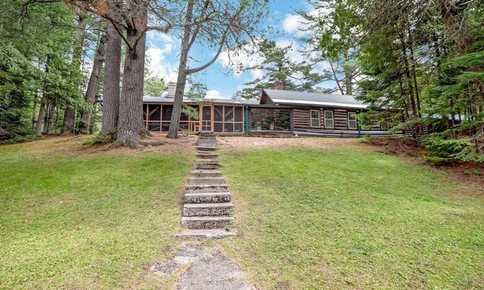Grayling Cabin | Club Thunderbird Lodge: A Rustic Retreat Wrapped in Fall's Fiery Colors