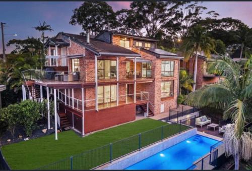 Tascott House | Coastal Luxury 2BR w Pool & Entertainer's Paradise
