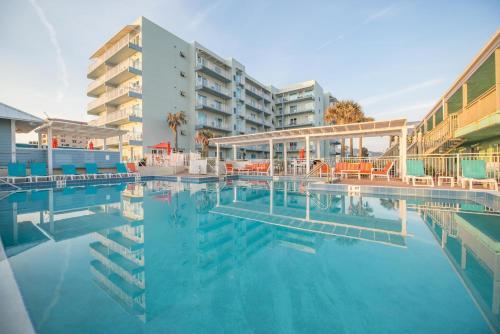 New Smyrna Beach Resort | Coconut Palms Beach Resort II a Ramada by Wyndham