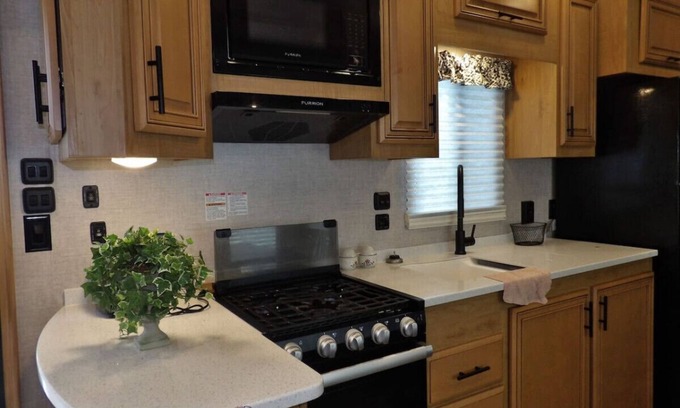 Rumsey House | Come and Stay at the Island this Property adjoins Island Paradise.