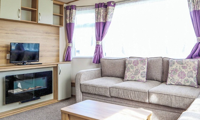Mablethorpe House | Comfortable modern 12ft-wide caravan with one double and two twin.