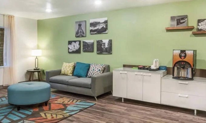 Newnan Hotel | Comfortable Space with Full Kitchen and Work Area for Business Travelers