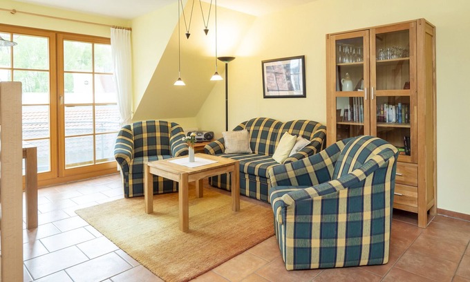 Zingst Apartment | Comfortable vacation apartment with balcony, indoor pool and garden view in Zingst