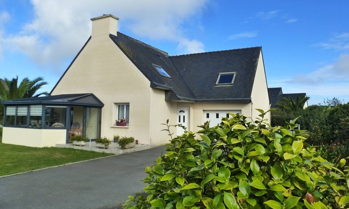 Plougoulm House | Comfortably furnished holiday home with a veranda
