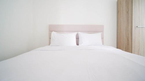 Surabaya Apartment | Compact and Tidy Studio at Puncak Dharmahusada Apartment By Travelio