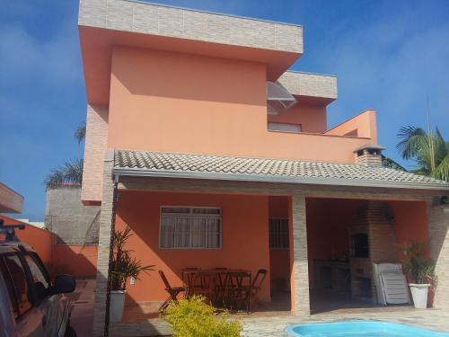 Ilha Comprida House | Conforto Laranja