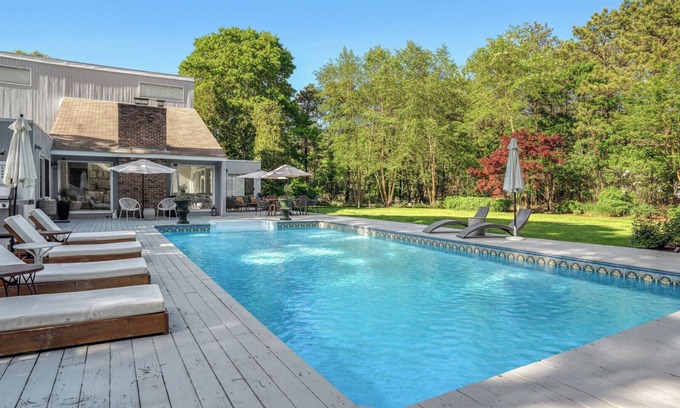 East Quogue House | Contemporary home close to beaches with private pool, open floorplan, and.