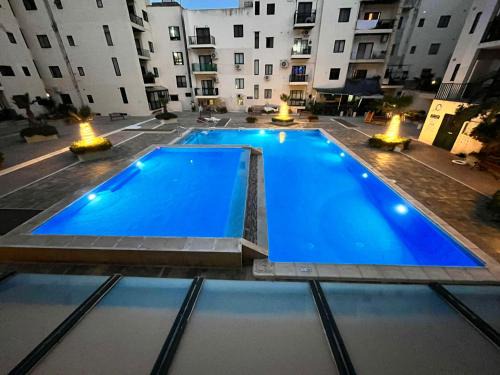 Bugibba Apartment | Cosy 4 Bedroom Apt with use of Pool