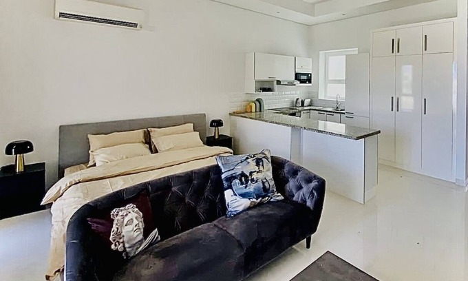 Taqah Apartment | Cosy studio with a lagoon view in Hawana resort