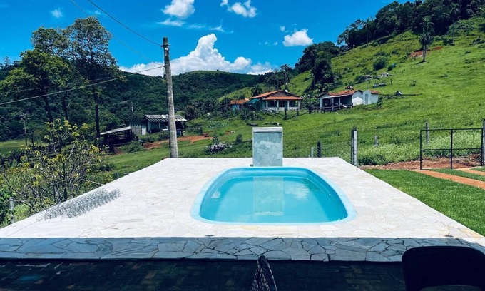 Agua Comprida House | Cozy farm in front of the dam, for water sports and fishing.