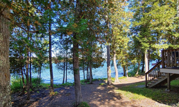Dexter House | Cozy lakefront home w/ a firepit, outdoor shower, & private beach!