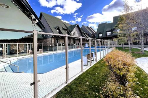 Canmore House | Cozy Mountain Chalet at Mystic Springs with Pool & Hot Tub Access