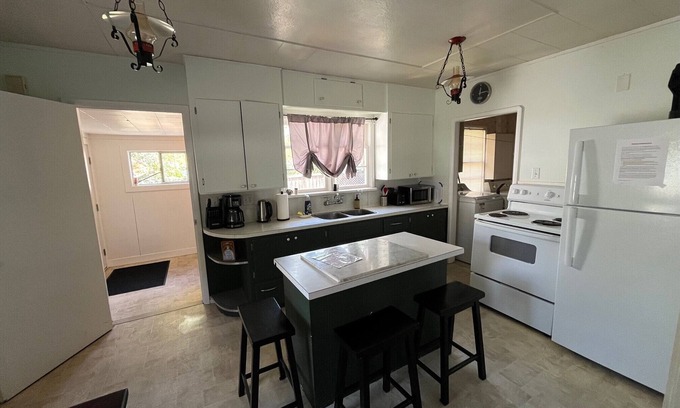 Duncan House | Cozy rustic 50's home located on a campground beside the Famous Cowichan River.