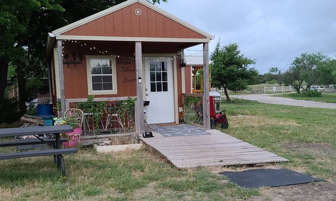 Kempner Cabin | Cozy Tiny Cabin with a small porch and firepit.