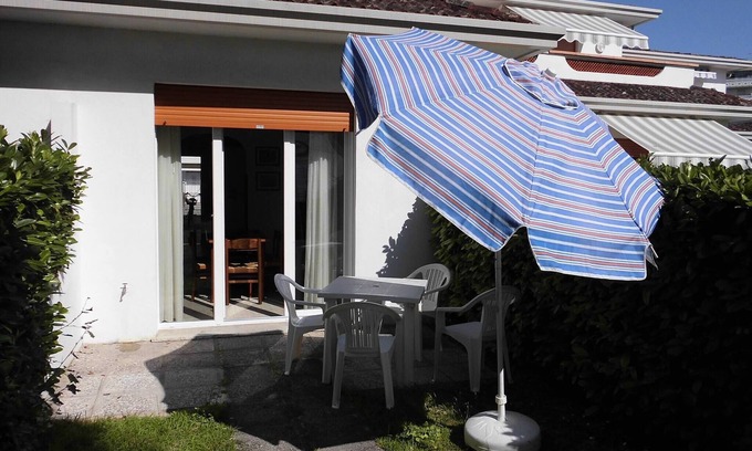 Porto Santa Margherita Villa | Cozy villa with private garden-Beahost