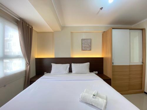 Cimahi Apartment | Cozy Well Furnished Deluxe 2BR at Gateway Pasteur Apartment By Travelio