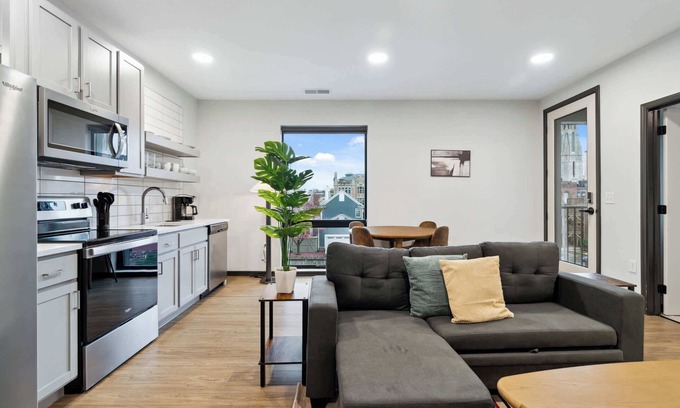 Lockerbie Square Apartment | CozySuites Mass with parking, lounge & roof deck #34