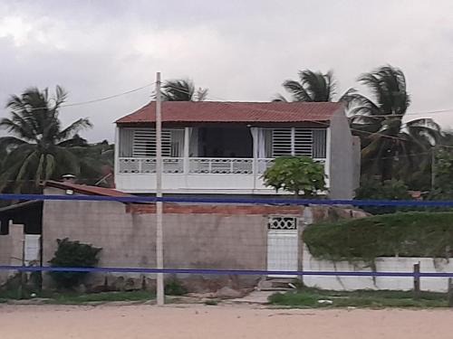 Pontal do Coruripe House | Csapenaareiaal quarto sem banheiro com vista pro mar