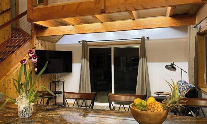 Honokaa Cottage | Custom cottage feels bright & airy yet cozy and private in this country setting.