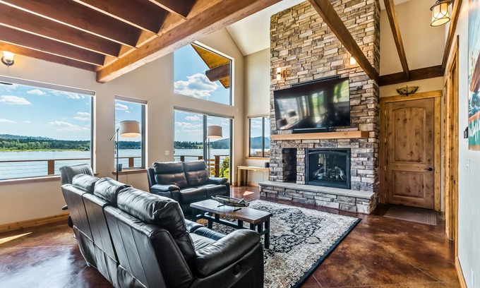 Laclede House | Custom riverfront home with private dock, game room, hot tub & heated floors