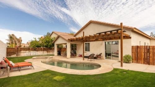 Coachella House | Desert Oasis w Pool Spa BBQ Outdoor Dining Under the Palms Calle Tolosa by AvantStay