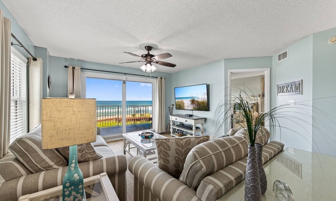 Seawinds Condo Condo | Direct oceanfront corner condo with large balcony, beachfront pool, and garage parking