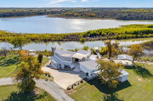 Runaway Bay House | Dock and Fire Pit Riverfront Runaway Bay Retreat