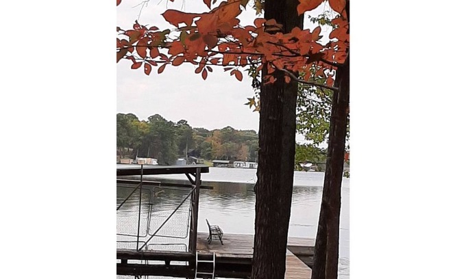 Hawkins House | Dock Holiday is a lakefront home with hot tub. Bring your fishing pole.