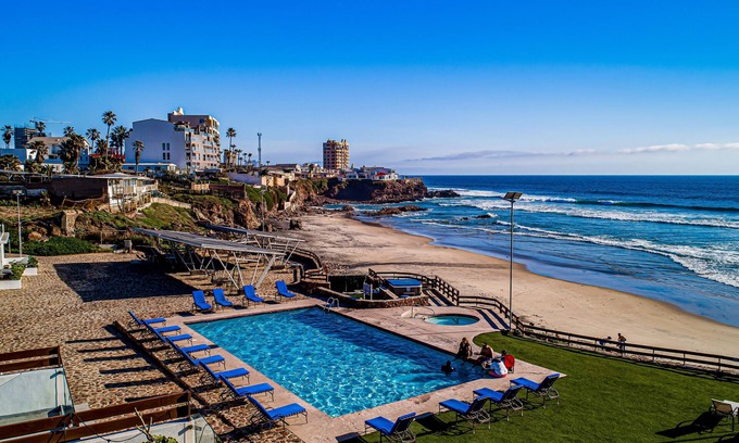 La Paloma House | Dog-friendly beachfront villa with pool & hot tub access plus rooftop deck