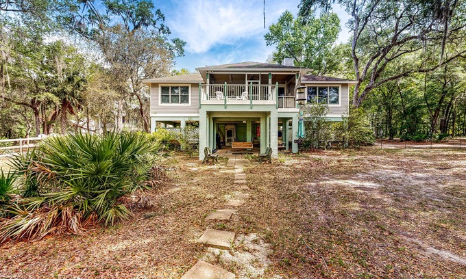 Bell House | Dog-friendly riverfront home - screened porch, 2 private docks, boat ramp access