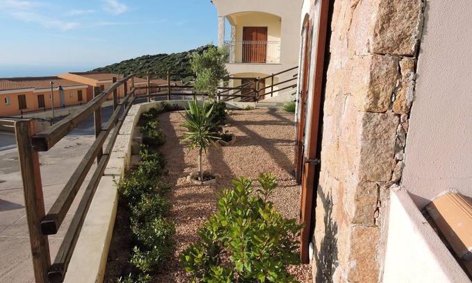 Trinita d'Agultu Apartment | Dolphin apartment with large sea view garden