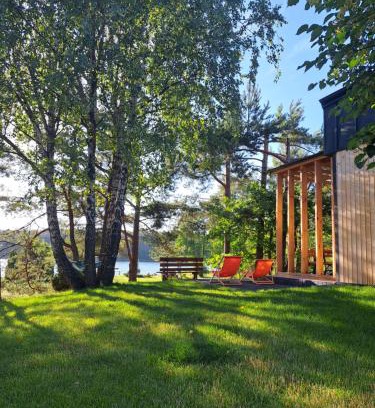 Czersk House | Domki przy jeziorze z prywatną plażą w Borach Tucholskich Pensjonat Alicja wczasy z dziećmi nowe luksusowe domki na skraju jeziora i lasu