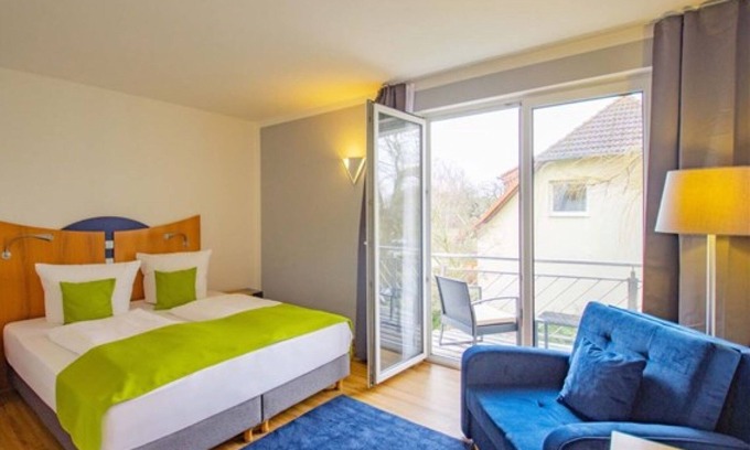 Buschvitz House | Doppelzimmer Komfort Balkon - Inselhotel Kleiner Bodden