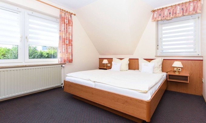 Esens Cottage | Doppelzimmer Lütje Hörn - Pension Nordkap in Bensersiel