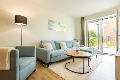 Dorumer Neufeld Apartment | Dorumer Seestern - Ferienwohnung mit Terrasse und Sauna